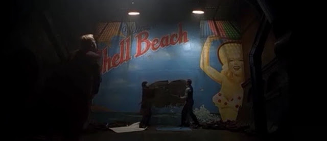 A brick wall with a postcard painting upon it for Shell Beach. in the film Dark City, this is revealed to have nothing but the vacuum of outer space behind it.