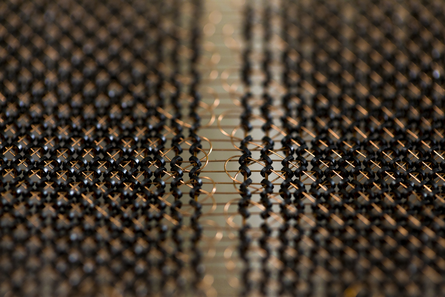 A plane of core memory. In other words, a very, very old RAM module with a magnetic ring to hold one bit.