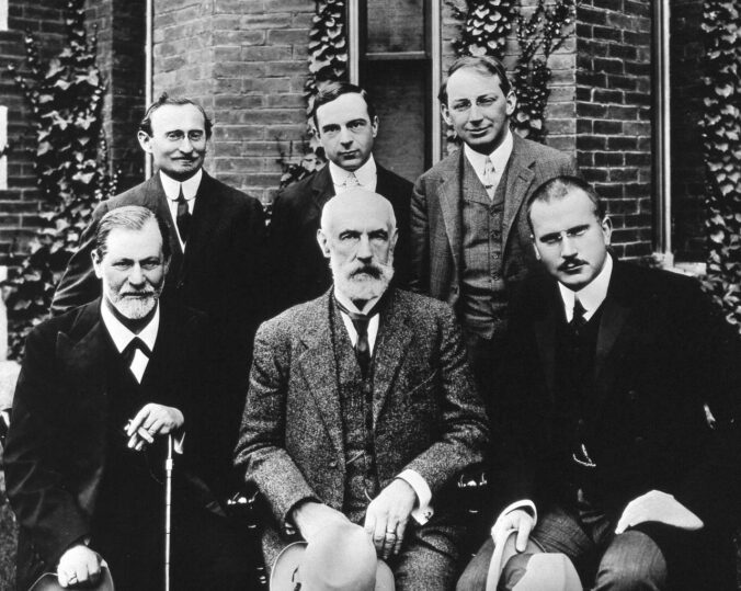 A group photo of early psychoanalysts, featuring Freud and Jung, in 1909.